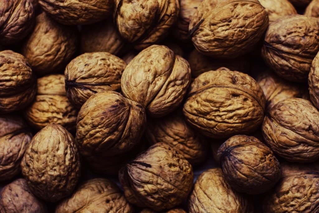 A close up picture of whole nuts with nutrients